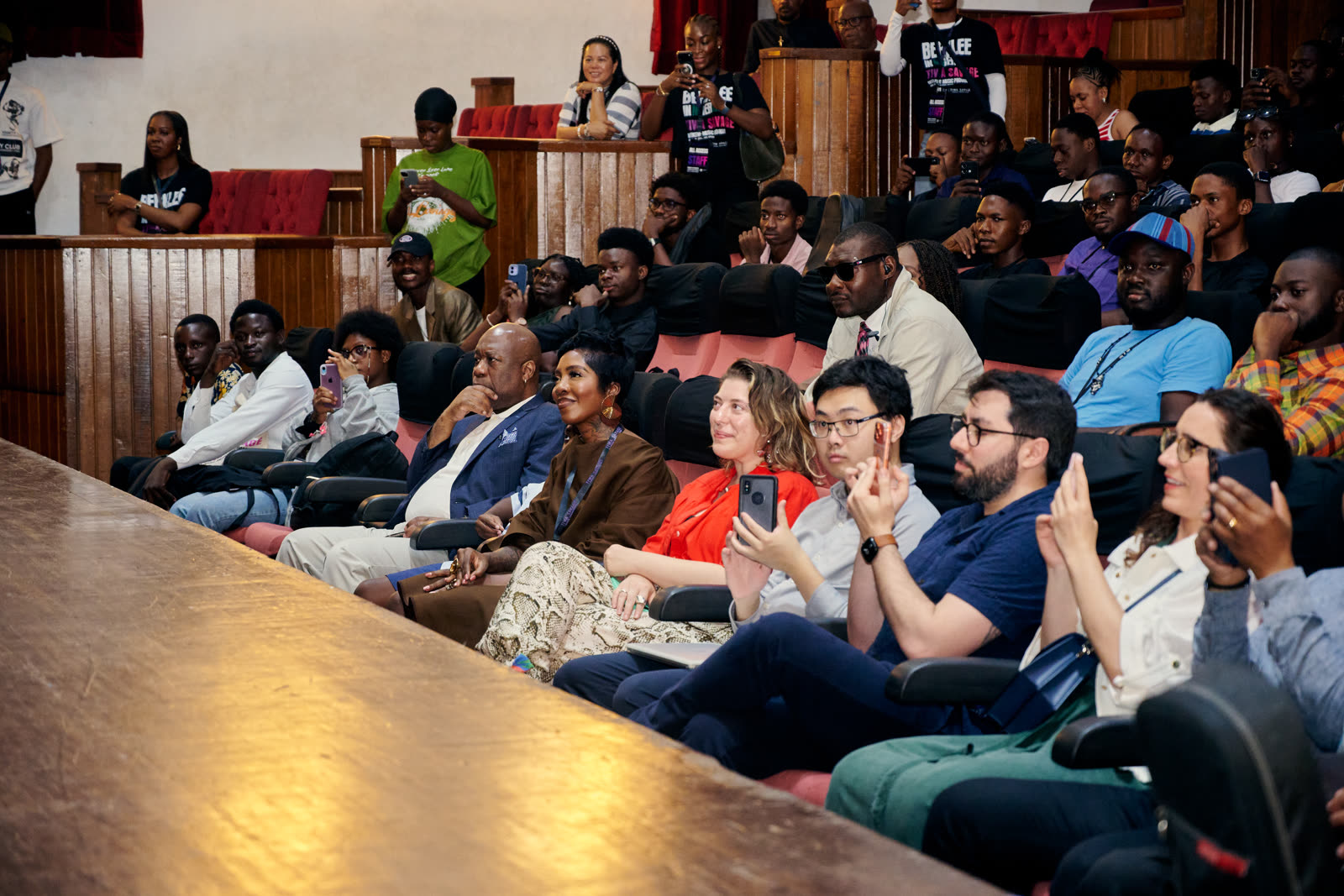 Faculty and guests in the audience during a session
